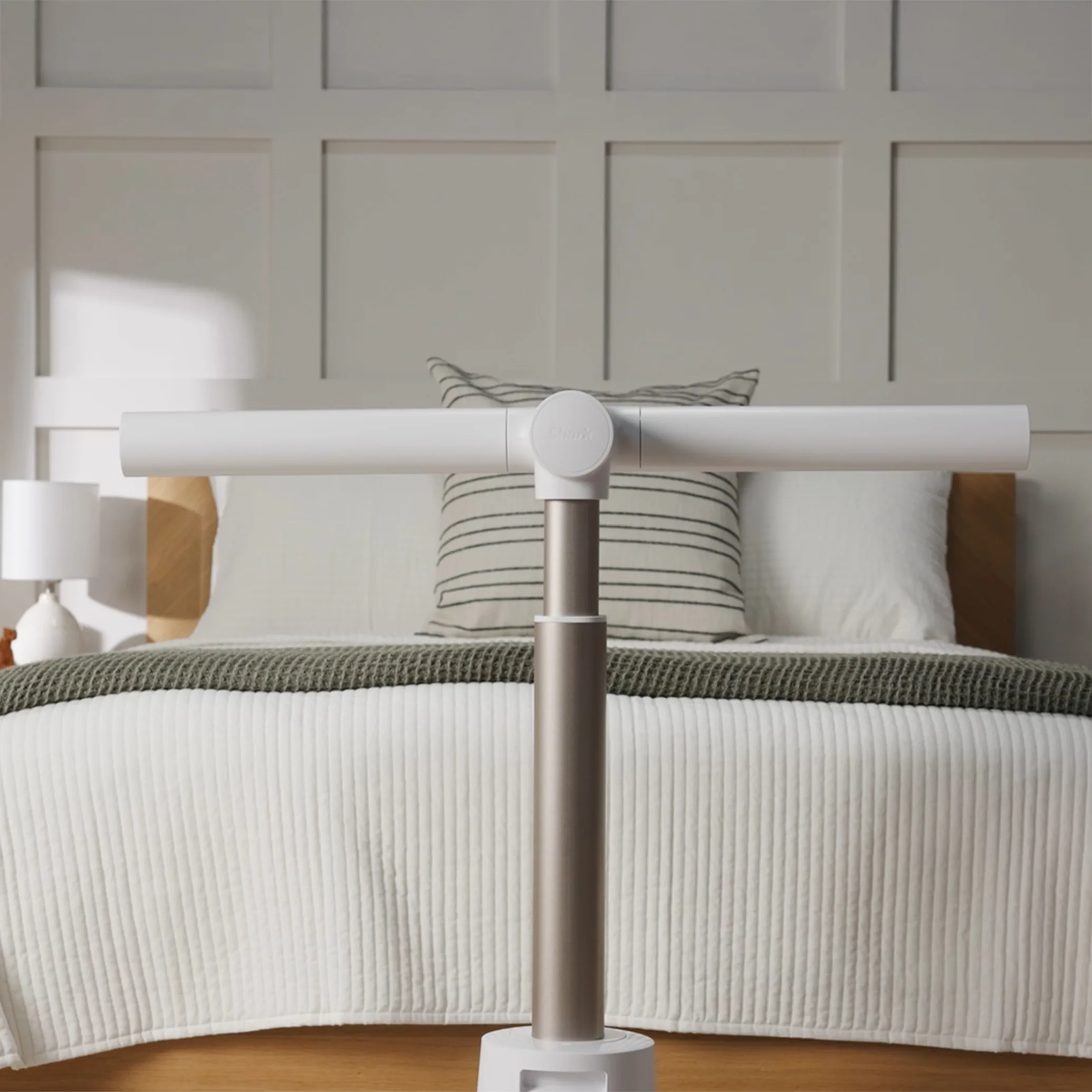 TurboBlade horizontal Air Blanket mode beside a bed